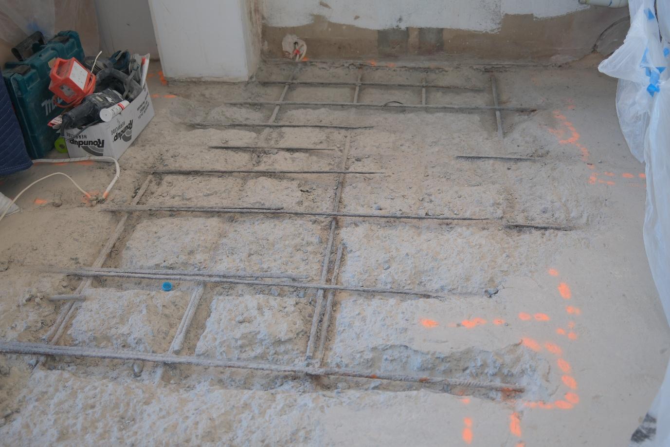 Exposed reinforcement prepared during concrete remediation works